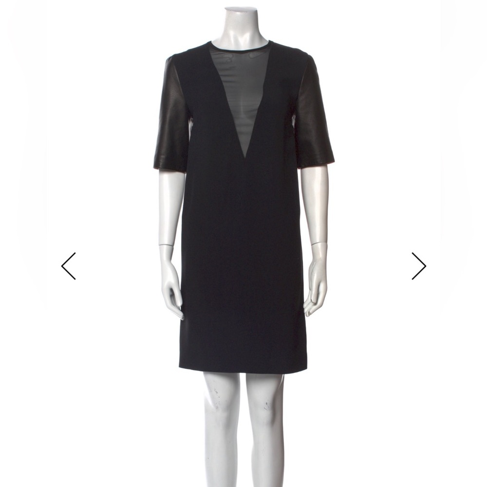Miu Miu Black Mini Dress with leather lambskin Sleeves. Excellent condition